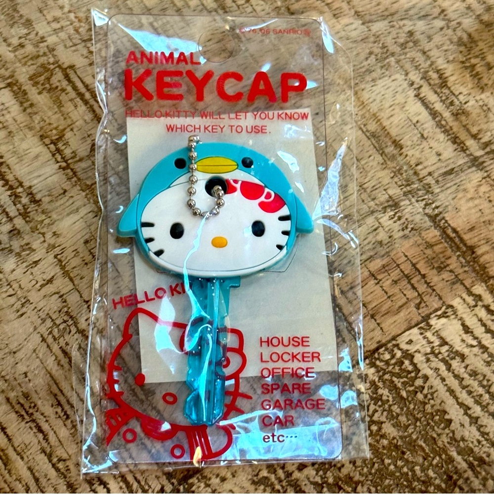 Hello Kitty 2008 Rare Penguin Hello Kitty Key cap. Unopened package.